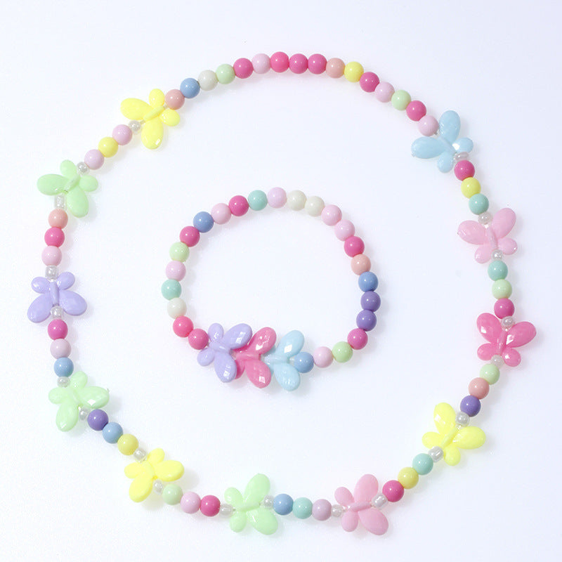 Ensemble bracelet et collier en perles de résine plastique en forme de papillon 